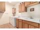 Bright laundry room with washer, dryer, and ample cabinetry at 108 Breezy Tree Ct # 202, Las Vegas, NV 89145