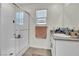 Bathroom with walk-in shower and granite vanity at 10931 Cambridge Lakes Ave, Las Vegas, NV 89166