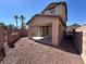 Private backyard with gravel and covered patio at 1096 Country Coach Dr, Henderson, NV 89002