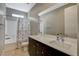 Modern bathroom with soaking tub, shower, and double vanity at 11275 Idyllic Dr # 101, Las Vegas, NV 89135