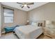 Spacious bedroom with large bed, nightstands and window at 11275 Idyllic Dr # 101, Las Vegas, NV 89135