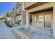 Inviting entryway with well-maintained landscaping and a paved walkway at 11275 Idyllic Dr # 101, Las Vegas, NV 89135