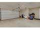 Attached garage with epoxy flooring and storage at 11275 Idyllic Dr # 101, Las Vegas, NV 89135