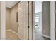 Hallway with doors to bedrooms and a light-toned floor at 11275 Idyllic Dr # 101, Las Vegas, NV 89135