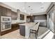 Modern kitchen with stainless steel appliances and an island at 11275 Idyllic Dr # 101, Las Vegas, NV 89135