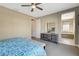 Main bedroom with king bed, ensuite access and dresser at 11275 Idyllic Dr # 101, Las Vegas, NV 89135