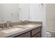 Double vanity bathroom with modern fixtures at 11809 Stone Run Ave, Las Vegas, NV 89138