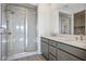 Modern bathroom with double vanity and shower at 11809 Stone Run Ave, Las Vegas, NV 89138