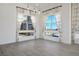 Bright dining room with large windows and modern lighting at 11809 Stone Run Ave, Las Vegas, NV 89138