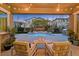 Relaxing backyard with a pool, patio, and string lights at 12031 Attiva Ave, Las Vegas, NV 89138