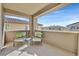 Private balcony with seating area offering scenic views at 12031 Attiva Ave, Las Vegas, NV 89138