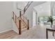 Modern staircase with wood and metal accents leading to upper level at 12031 Attiva Ave, Las Vegas, NV 89138