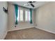 Bright bedroom with carpet flooring and ceiling fan at 1254 Venue St # 102, Las Vegas, NV 89135