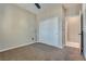 Spacious bedroom with sliding closet doors and carpet flooring at 1254 Venue St # 102, Las Vegas, NV 89135