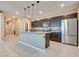 Modern kitchen with stainless steel appliances and an island at 1254 Venue St # 102, Las Vegas, NV 89135