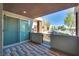 Private patio with brick pavers and gated access at 1254 Venue St # 102, Las Vegas, NV 89135