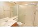 Bathroom with shower/tub combo and a vanity with sink at 1526 Carriagedale Ct, Las Vegas, NV 89110