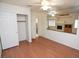 Bedroom with wood floors and a view into the living room at 1526 Carriagedale Ct, Las Vegas, NV 89110