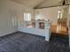 Bright dining room with hardwood floors and a view of the kitchen at 1526 Carriagedale Ct, Las Vegas, NV 89110