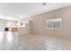 Open concept dining area with tile floors and kitchen views at 1619 Wendell Williams Ave, Las Vegas, NV 89106