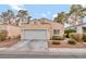 One-story house with attached garage and desert landscaping at 1619 Wendell Williams Ave, Las Vegas, NV 89106