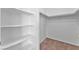 Spacious walk-in closet with ample shelving at 1619 Wendell Williams Ave, Las Vegas, NV 89106