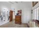 Bedroom with a dresser, built-in closet, and a tranquil atmosphere at 1704 Hassett Ave, Las Vegas, NV 89104