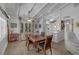 Charming dining room with wooden table and access to kitchen at 1704 Hassett Ave, Las Vegas, NV 89104