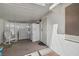 Exterior view of covered patio area with chairs and a refrigerator at 1704 Hassett Ave, Las Vegas, NV 89104