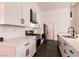 Clean kitchen with stainless steel appliances and white cabinets at 1781 Lakewood Dr, Henderson, NV 89012