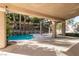 Covered patio overlooking the pool and backyard at 1781 Lakewood Dr, Henderson, NV 89012