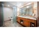 Elegant bathroom with double vanity, large mirror, and walk-in shower at 2000 Fashion Show Dr # 5400, Las Vegas, NV 89109