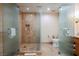 Spa-like bathroom with double sinks, large shower, and separate toilet at 2000 Fashion Show Dr # 5400, Las Vegas, NV 89109