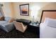 Comfortable bedroom with a workspace, a sofa, and a bed at 2000 Fashion Show Dr # 5428, Las Vegas, NV 89109