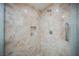 Modern shower stall with marble tile and built-in shelf at 2000 Fashion Show Dr # 5428, Las Vegas, NV 89109