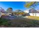 Inviting backyard oasis featuring a sparkling pool and covered patio at 2044 Glorieta Ln, Las Vegas, NV 89134