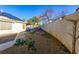 Backyard with a patio, grassy area, and a rock pathway at 2044 Glorieta Ln, Las Vegas, NV 89134