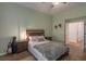 Bright bedroom with wood flooring and built-in shelving at 2044 Glorieta Ln, Las Vegas, NV 89134