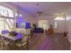 Open concept dining area with hardwood floors and a large aquarium at 2044 Glorieta Ln, Las Vegas, NV 89134