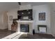 Living room with a gas fireplace and built-in shelving at 2044 Glorieta Ln, Las Vegas, NV 89134