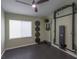 Home gym with wall-mounted rig and weight plates at 2044 Glorieta Ln, Las Vegas, NV 89134