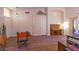 Living room features hardwood floors and a vintage piano at 2044 Glorieta Ln, Las Vegas, NV 89134