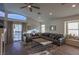 Bright living room with vaulted ceilings and sliding doors to patio at 2044 Glorieta Ln, Las Vegas, NV 89134