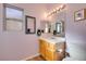 Clean bathroom with updated vanity and tiled flooring at 2091 Poppywood Ave, Henderson, NV 89012