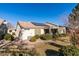 Home exterior showcasing solar panels and a covered patio at 2091 Poppywood Ave, Henderson, NV 89012