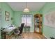 Bright home office features built-in shelving and window at 2091 Poppywood Ave, Henderson, NV 89012