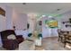 Cozy living room featuring hardwood floors and comfortable seating at 2091 Poppywood Ave, Henderson, NV 89012