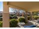 Relaxing patio with views of the landscaped yard at 2091 Poppywood Ave, Henderson, NV 89012