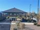 Community picnic area with shaded tables and benches at 2110 Millergrove Ave, North Las Vegas, NV 89086