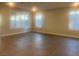 Bright and airy living area with plantation shutters and tile floors at 2110 Millergrove Ave, North Las Vegas, NV 89086